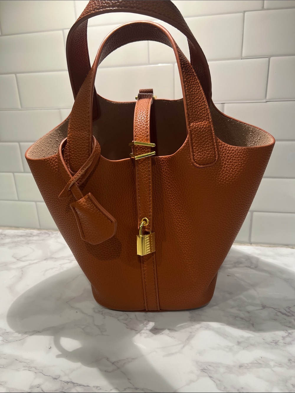 Structured Leather Bucket Tote in Brown with Gold Lock